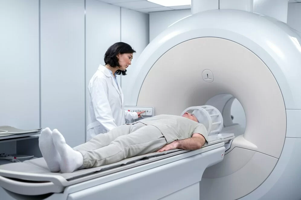 doctor-getting-patient-ready-ct-scan_23-2149367454.jpg